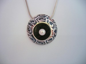 Feng Shui Swirl Pendant by Henriette van Battum 